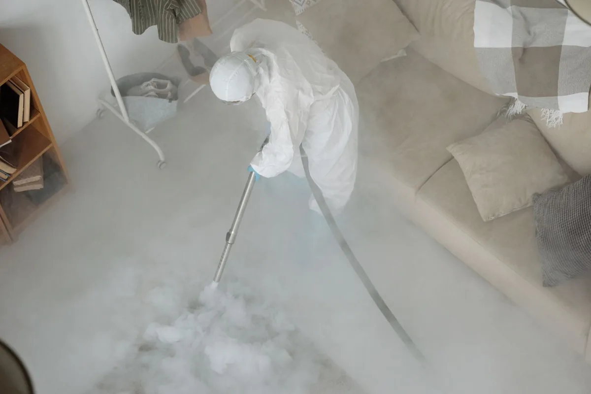 Biohazard cleanup technician in protective equipment, San Lorenzo, CA
